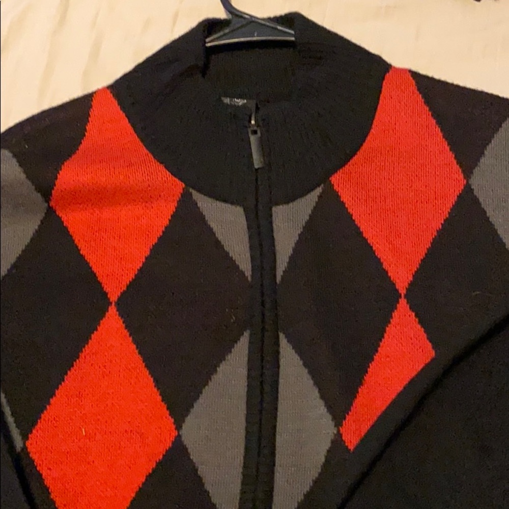 Red white and black sweater